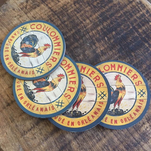 Yellow Rooster Coasters with red text